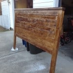 A brown, wooden headboard