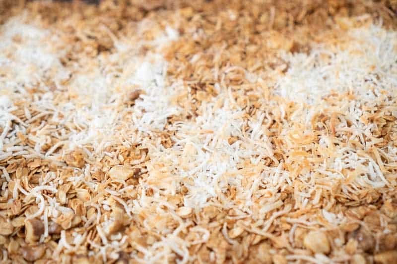 close up of granola before baking with oats and coconut