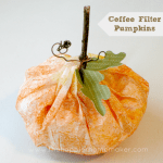 A close up of a coffee filter pumpkin