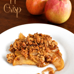 A close up of peanut butter  apple crisp on a white plate