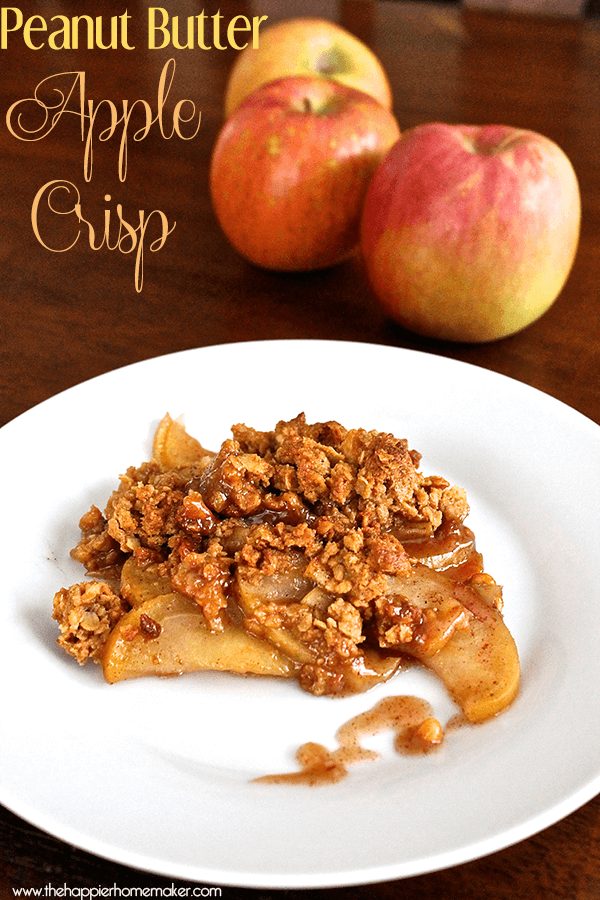 A close up of peanut butter  apple crisp on a white plate