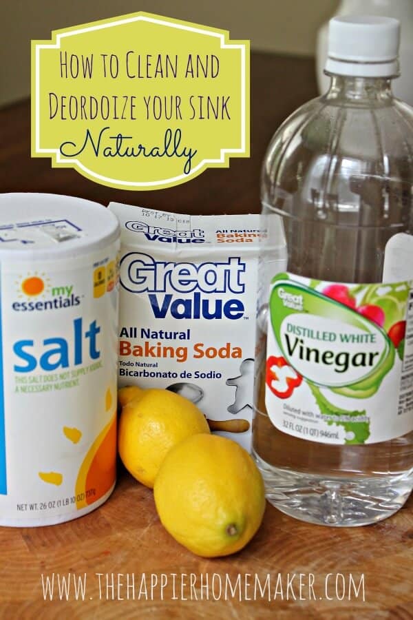 The ingredients of how to clean a stainless steel sink including baking soda, salt, lemons, and vinegar