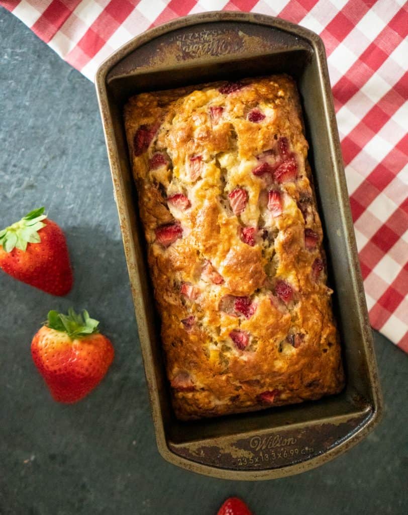 \loaf of strawberry banana bread in a baking pan