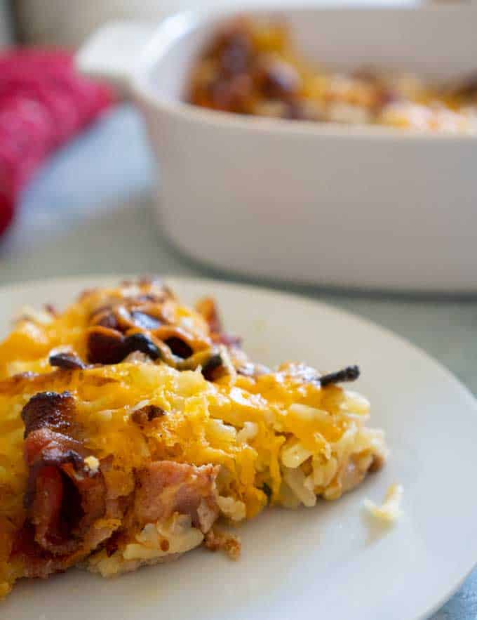 bacon hash brown casserole on a white plate