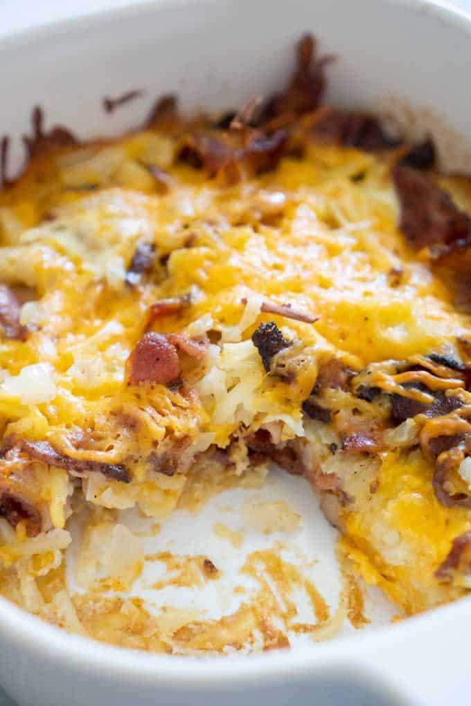 Cheesy Bacon, Sausage, and Egg Hash Brown Skillet Recipe