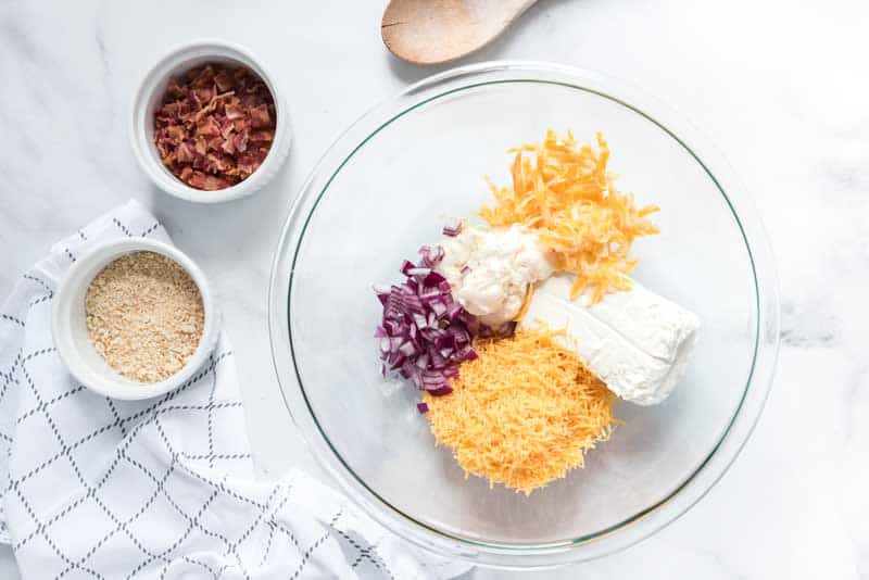 charleston cheese dip ingredients in glass bowl