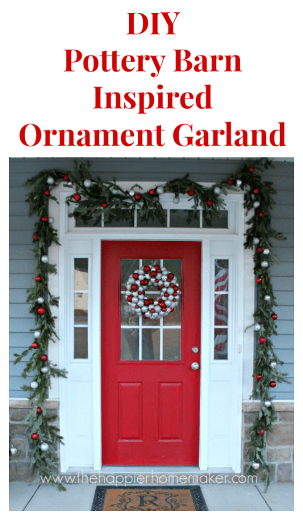 Ornament garland around a red door trimmed with windows