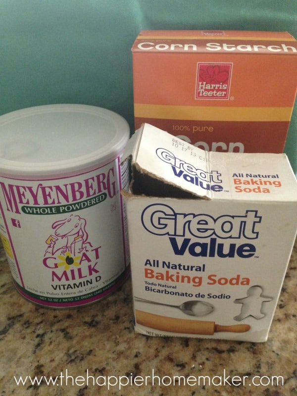 A collection of products to make homemade milk bath including baking soda and goat bilk