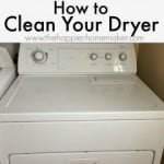 A white, front load dryer used as an example of how to clean a dryer