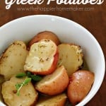 lemon roasted greek potatoes in white bowl