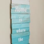 DIY ombre wood shim sign reading "home is where the heart is"