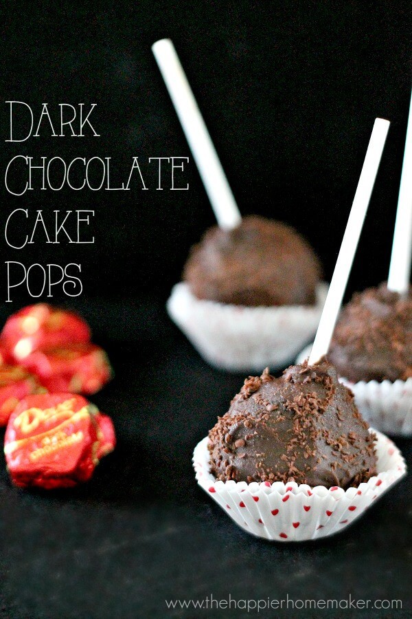 A close up of dark chocolate cake pops