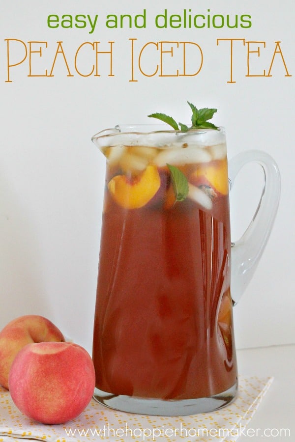 peach iced tea in glass pitcher
