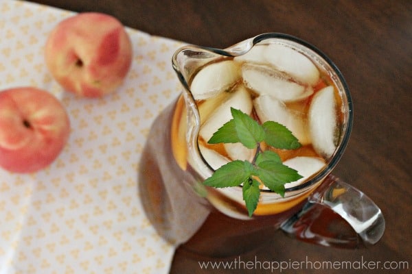 overhead picture of a peach iced tea pitcher