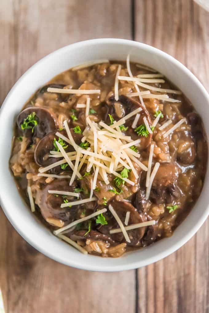 mushroom risotto in white bowl