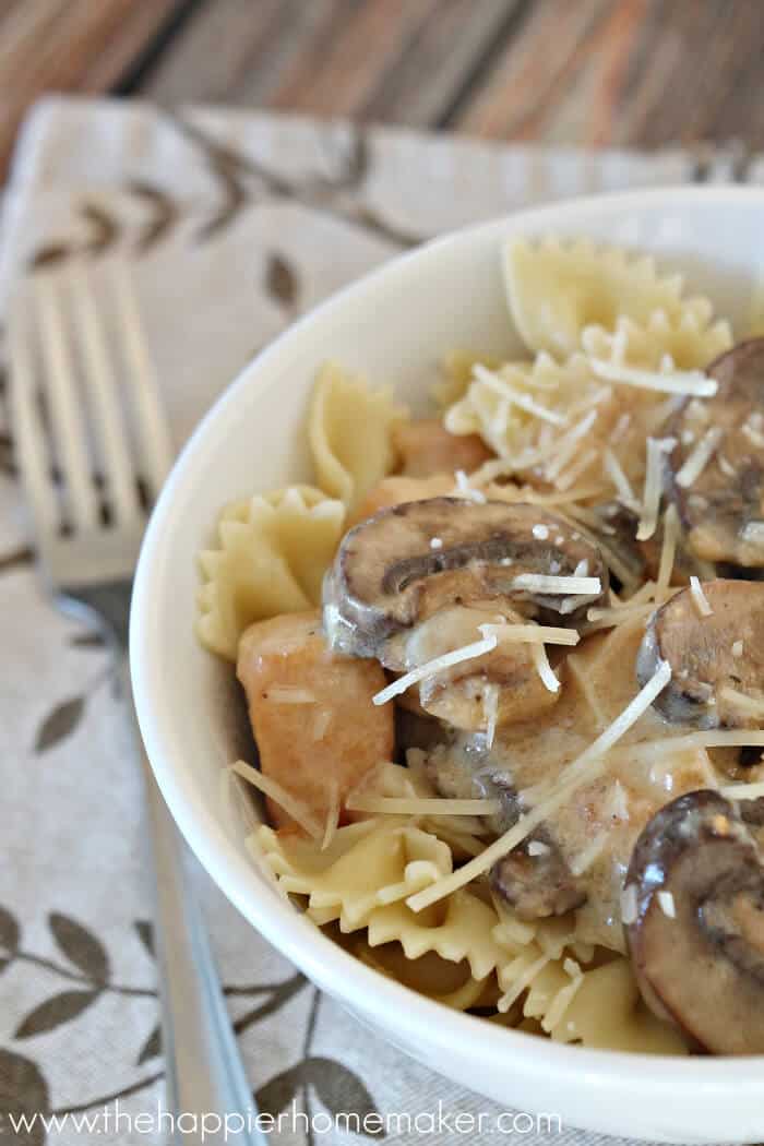 A close up of Parmesan mushroom chicken on a brown napkin