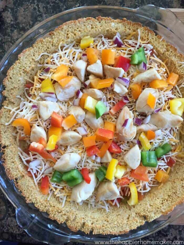 An overhead picture of a Mexican pizza on a couscous pizza crust 