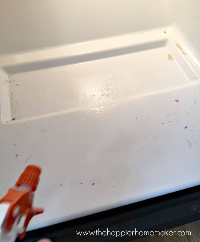 cleaning bottom fridge