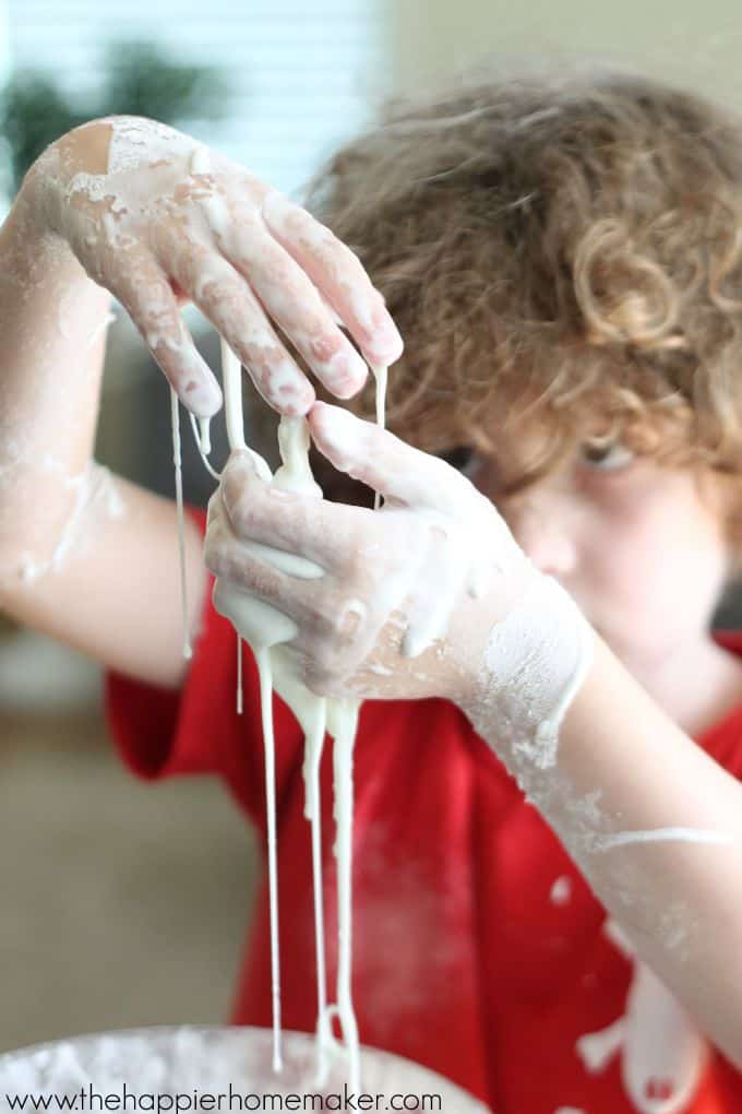 A child playing with non-newtonian fluid