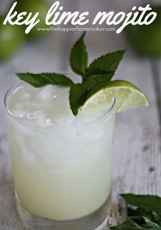 A glass of key Lime Mojito topped with a lime slice