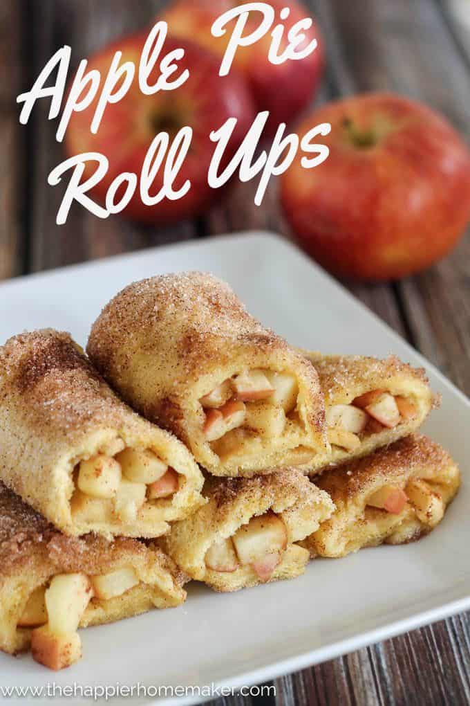 close up of apple pie roll ups on a white dish