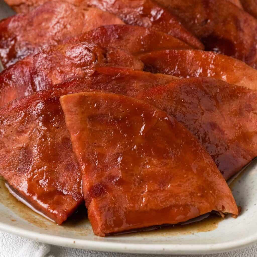 close view of sliced slow cooker glazed ham