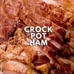 close up of sliced cooked ham in crock pot