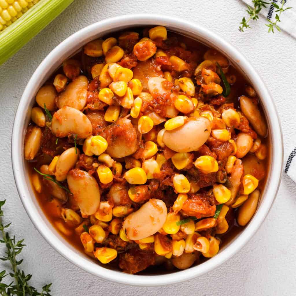 white bowl full of succotash
