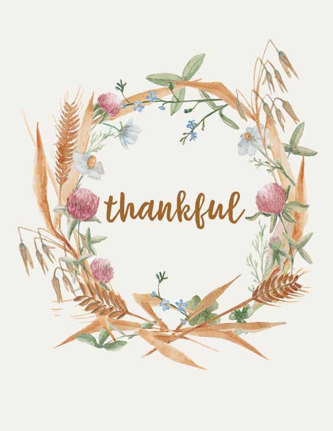 A drawing of a fall wreath with the word "thankful" in the middle