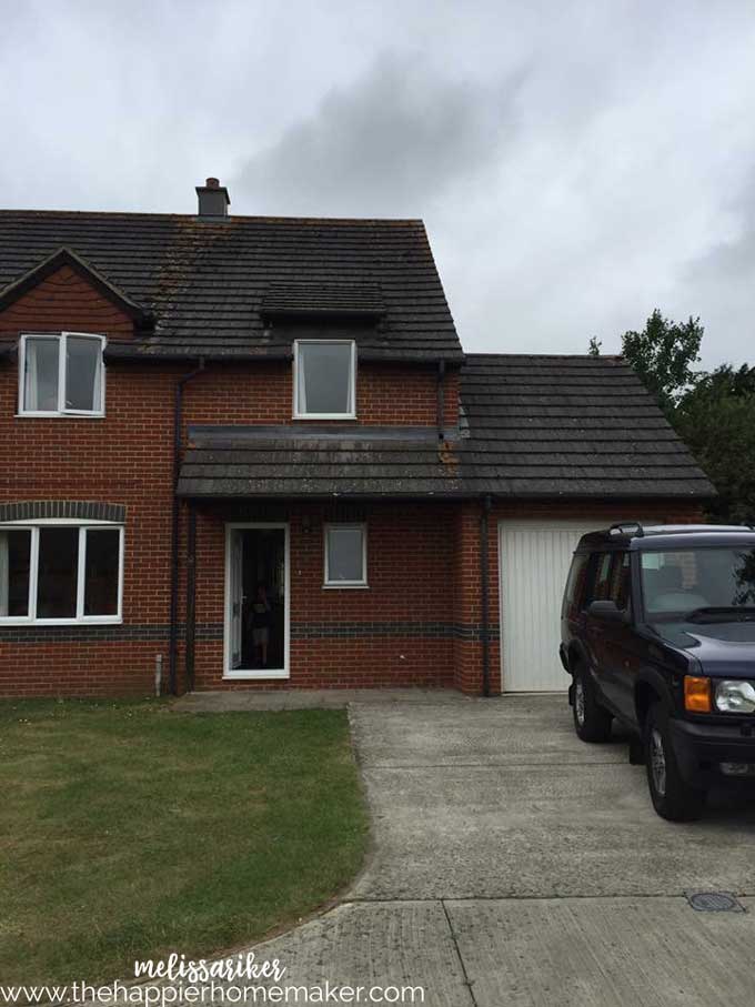 A land rover parked in front of a house in England