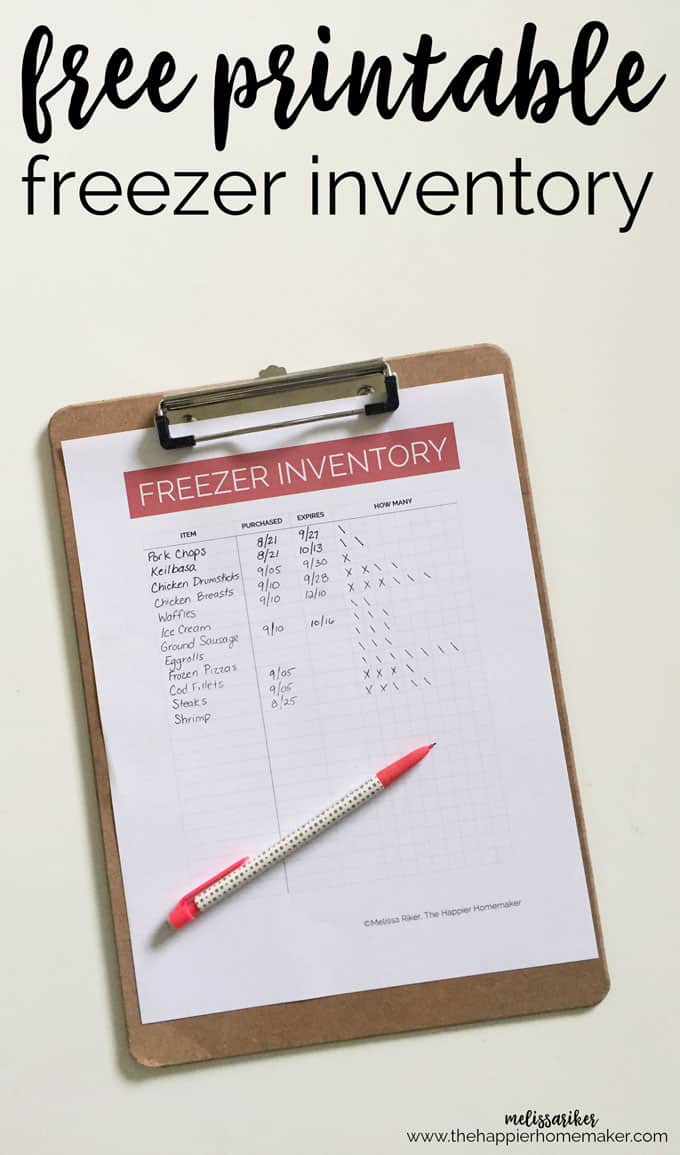 a piece of paper titled "Freezer Inventory" on a clipboard with a pen on it