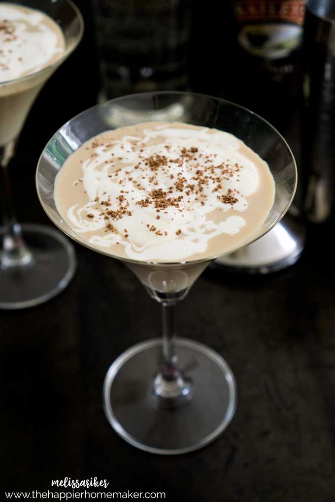 A martini glass filled with a mudslide latte cocktail