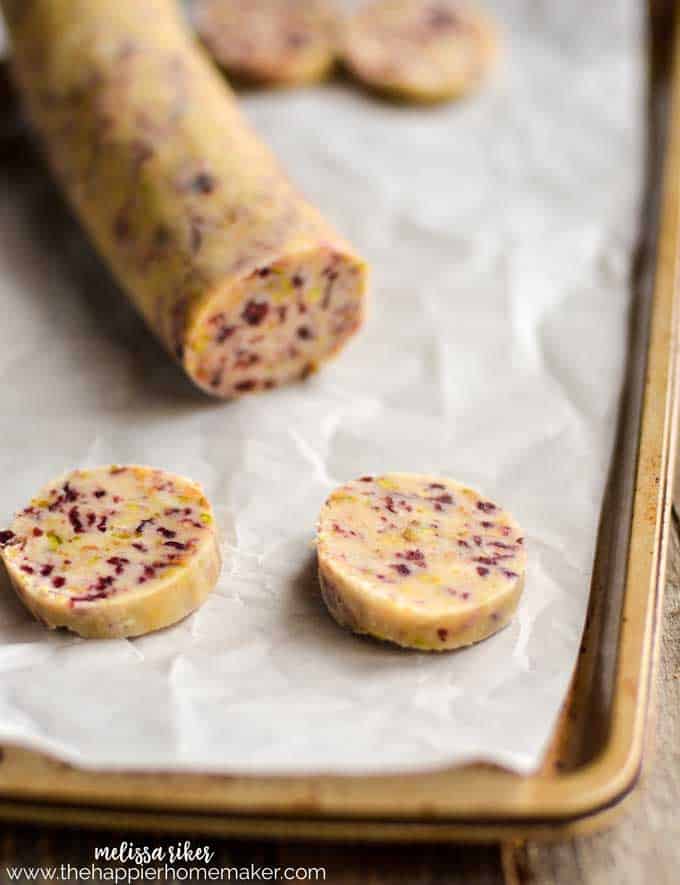 cranberry and pistachio shortbread cookies slices and preparing for baking