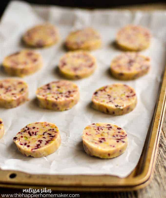 cranberry and pistachio shortbread cookies slices ready for baking