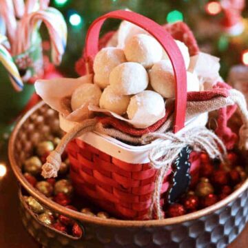almond snowball cookies in red basket