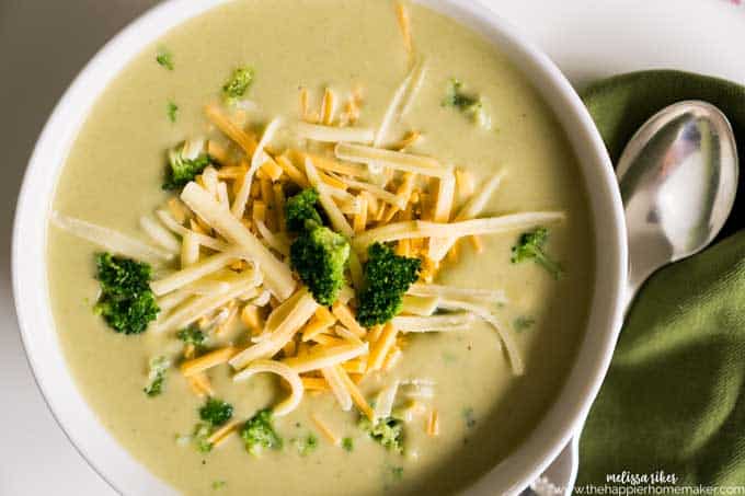 broccoli Cheese Soup garnished with shredded cheese