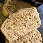 A close up of Guinness beer bread with a can of Guinness in the background