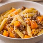 bowl with butternut squash and sausage pasta