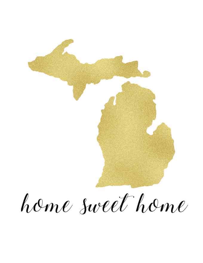 A printable of the state of Michigan in gold with "home sweet home" underneath in cursive 