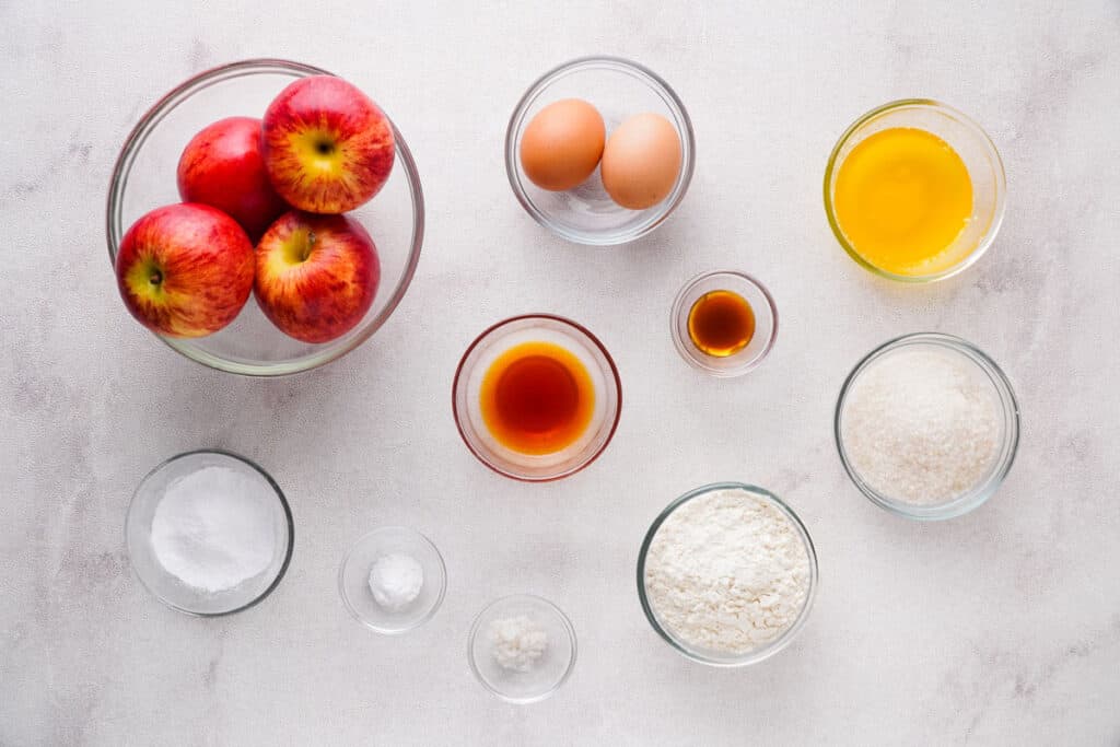 French apple cake ingredients in bowls