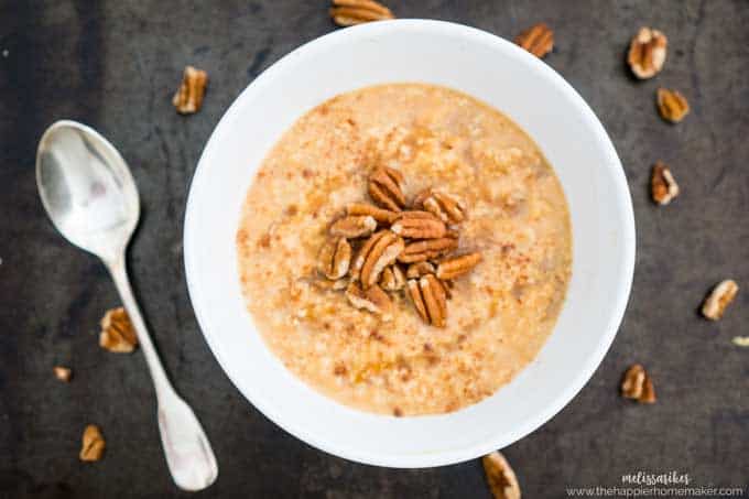 bowl of pumpkin oatmeal topped with pecans