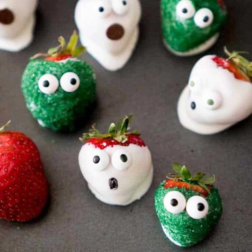 chocolate covered strawberries that look like zombies and ghosts
