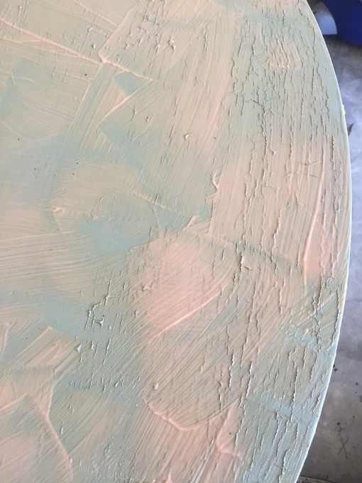 A close up of a table with citristrip paint stripper on it