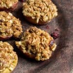 A close up of baked apples with oatmeal crisp