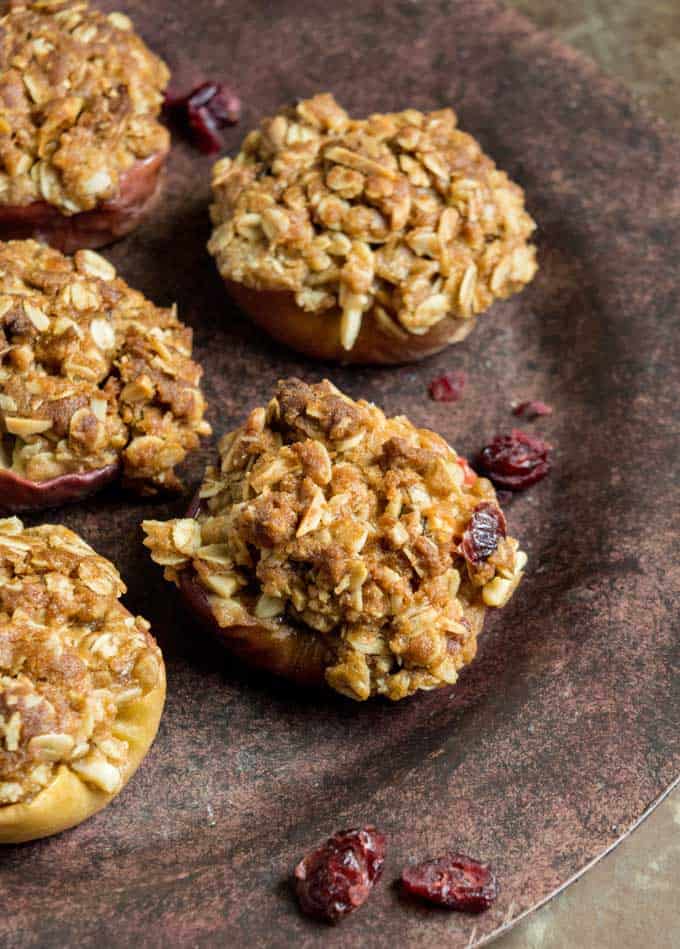 A close up of baked apples with oatmeal crisp