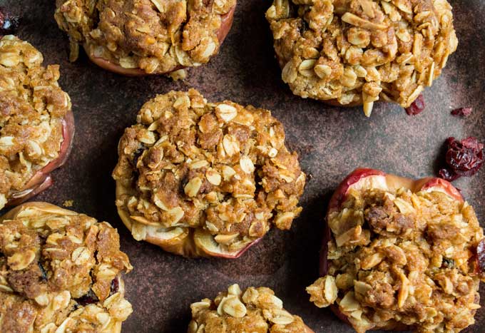 A close up of baked apples with oatmeal crisp