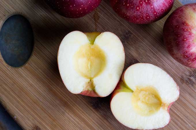 An apple sliced in half without the core