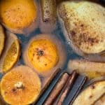 cinnamon oranges apples in water simmer pot