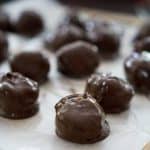 Chocolate Peanut Butter Balls (aka Buckeyes) are a classic holiday dessert recipe. Only 4 ingredients and super easy!