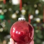 A close up of a red Christmas ornament